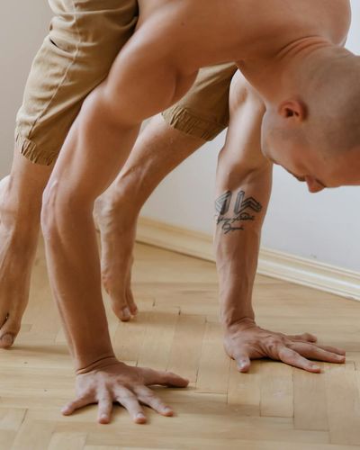 Man performing balance exercises for physical stability